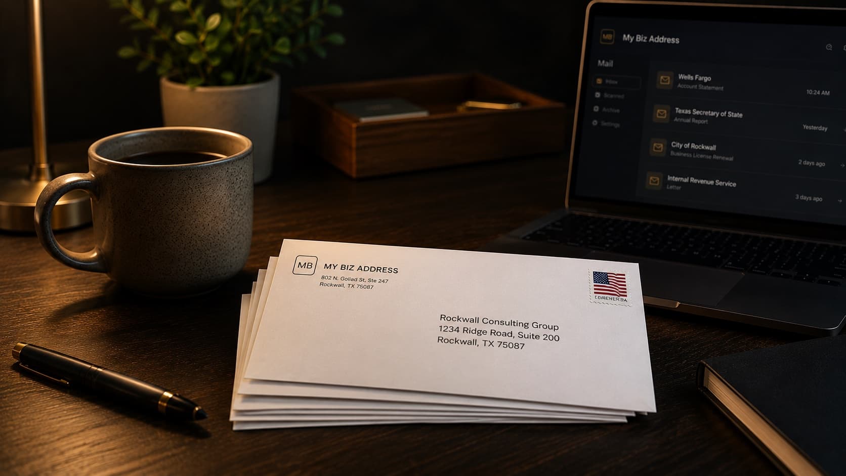 My Biz Address envelopes addressed to a Rockwall business on a desk, beside a coffee mug and a laptop showing the online mail dashboard.